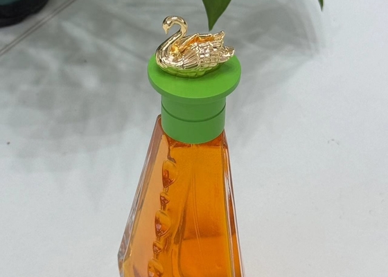 comprare Cappucci di profumo Zamak a forma di cigno colorati Top di bottiglia di profumo di metallo di lusso online manufacture