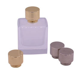 comprare tappi di bottiglia del profumo infilati 23*27mm in lega di zinco per le piccole bottiglie di profumo online manufacture
