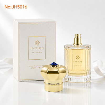 Hot Selling Dubai Saudi Luxury Mirror Gold 8 Petal Crown Zamac Perfume Cap JH5016 Single Sapphire Blue Crystal Smooth Royal Metal Oud Attar Copertura di bottiglia Logo inciso su misura